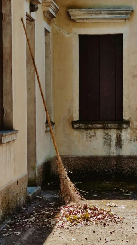 a broom and trash are being thrown in the air