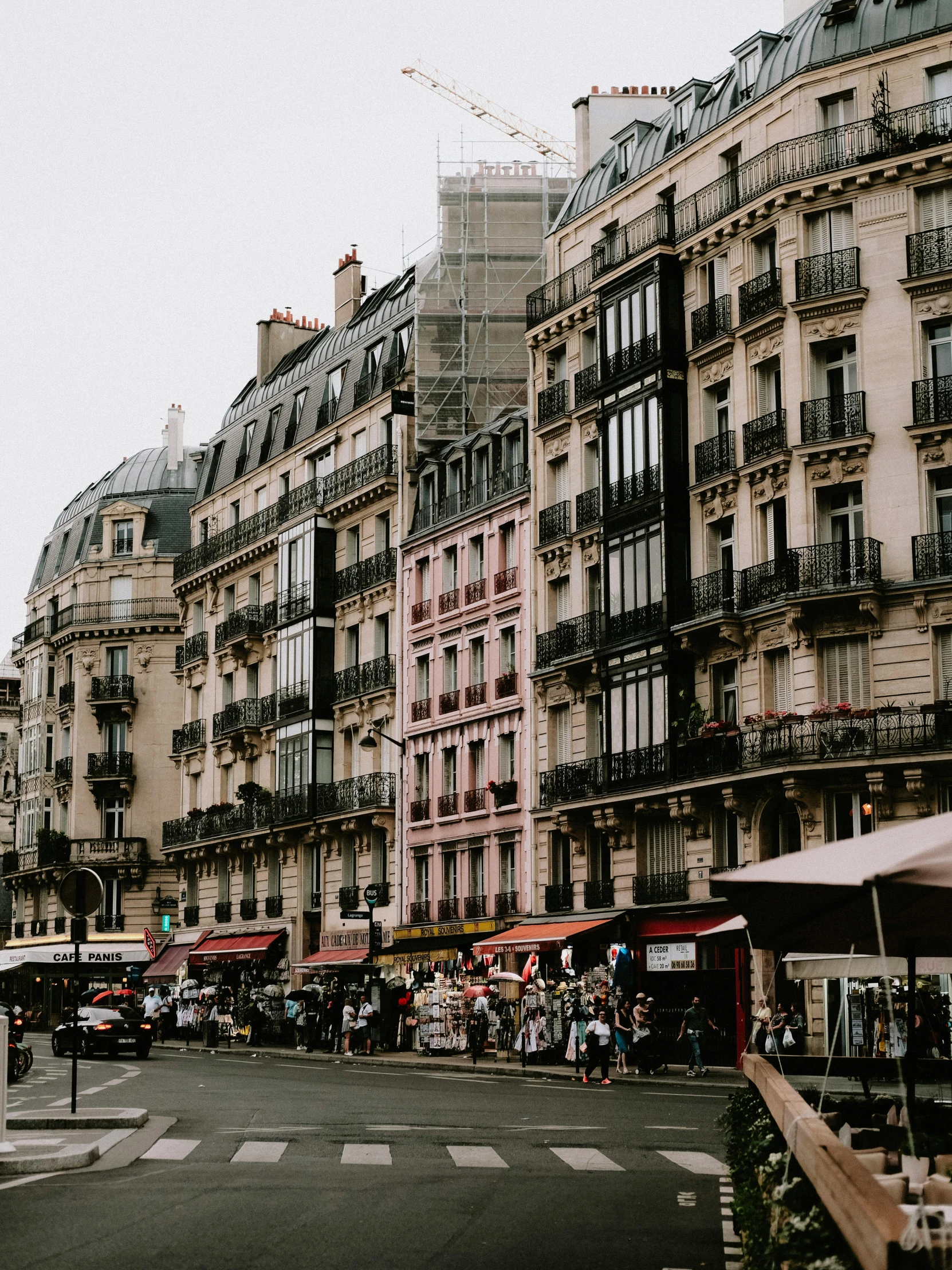 the road leads through different types of buildings