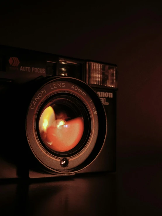 a digital camera sitting on top of a counter