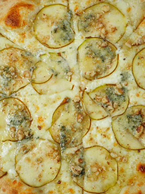 a close - up view of a sliced pizza with vegetable toppings