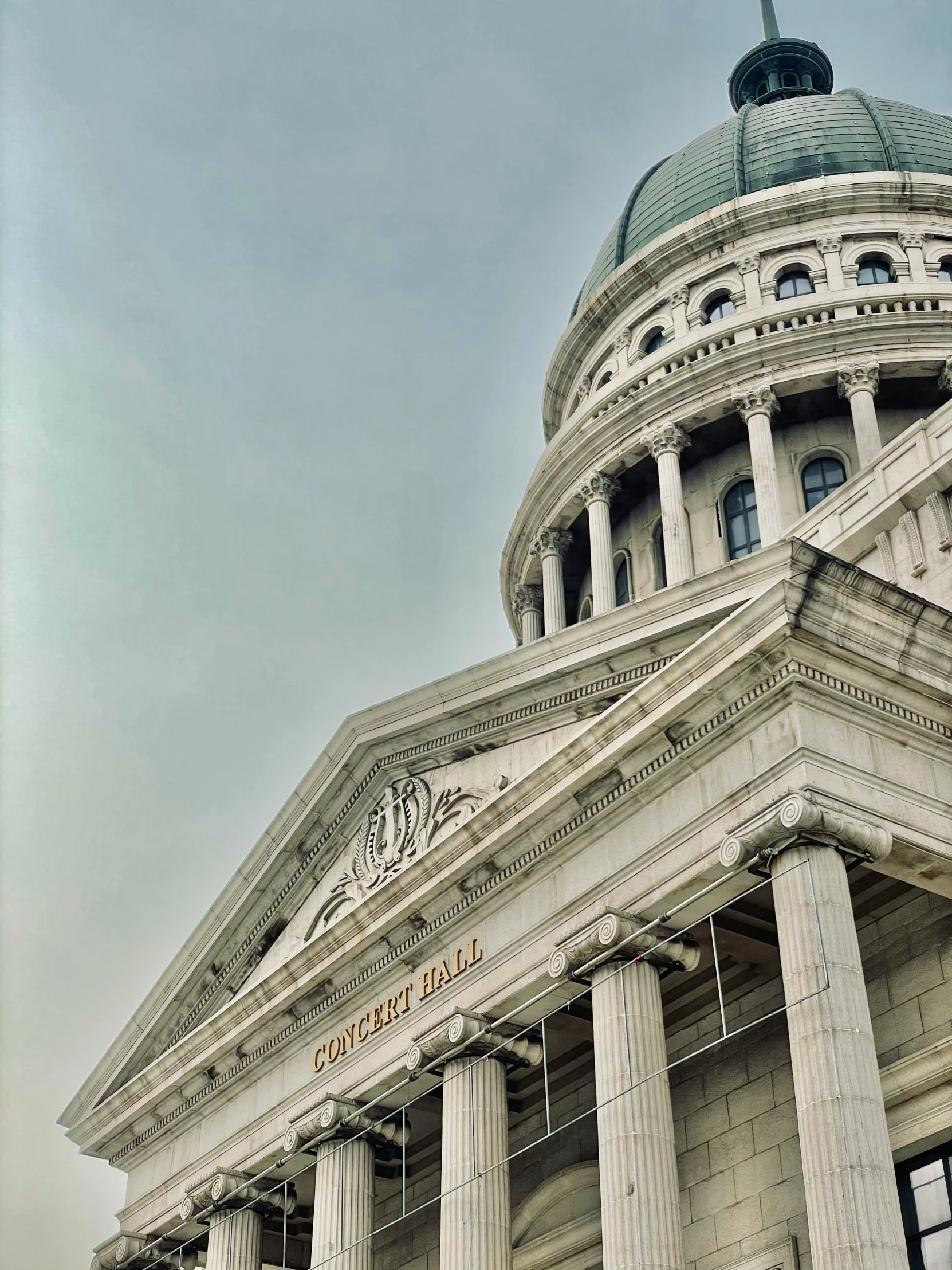 a po of a large building with pillars in front