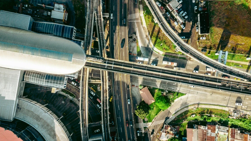 an aerial view of a city street in the daytime