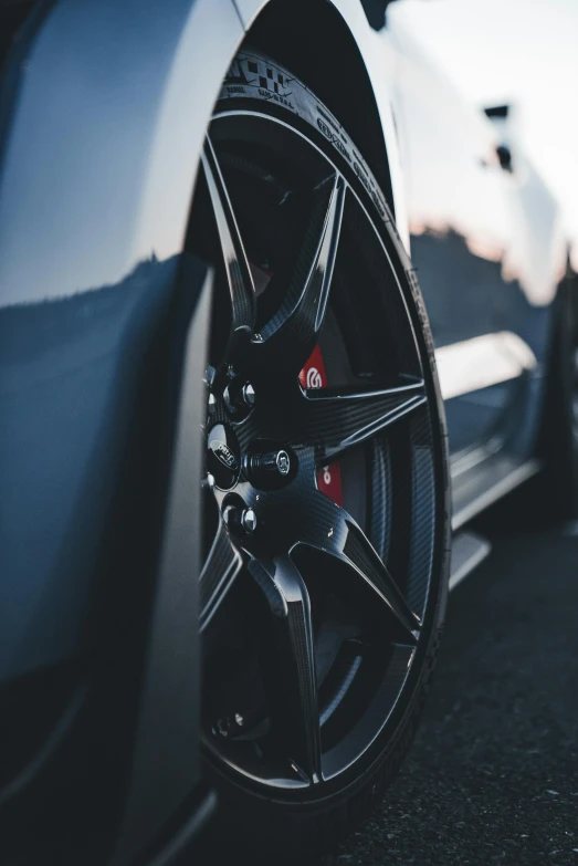 some very pretty wheel on some sort of sport car