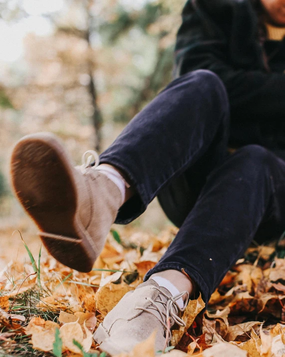 an image of a man in the fall leaves