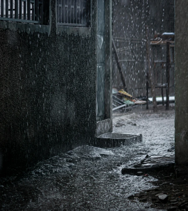 a rain gutter sitting next to an open doorway