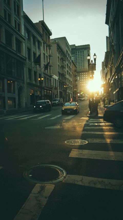 a car traveling down a city street at night