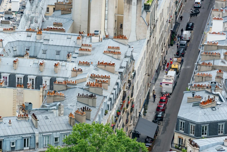 a long line of buildings and trees next to each other