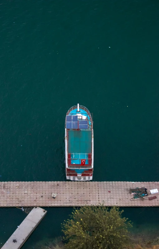 a boat sits on a dock with an empty area