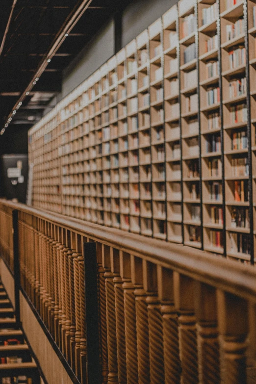 stacks of books lined up against a wall