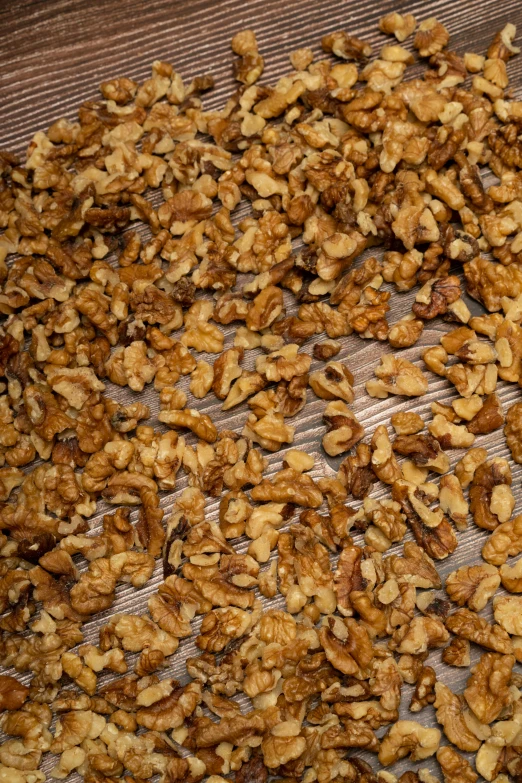 several pieces of toasted nuts arranged on top of a mesh