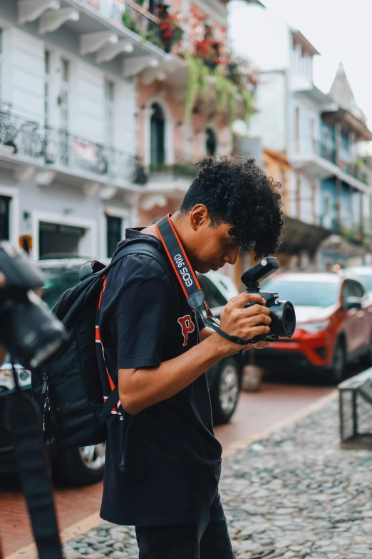 a man using a phone on the street