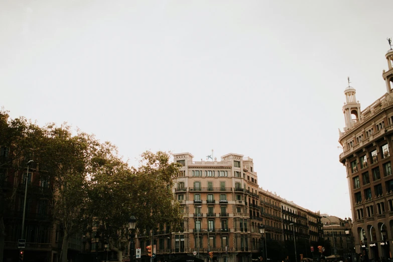 buildings line the streets near a street intersection