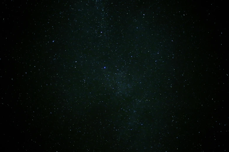 a large blue object in the sky with stars