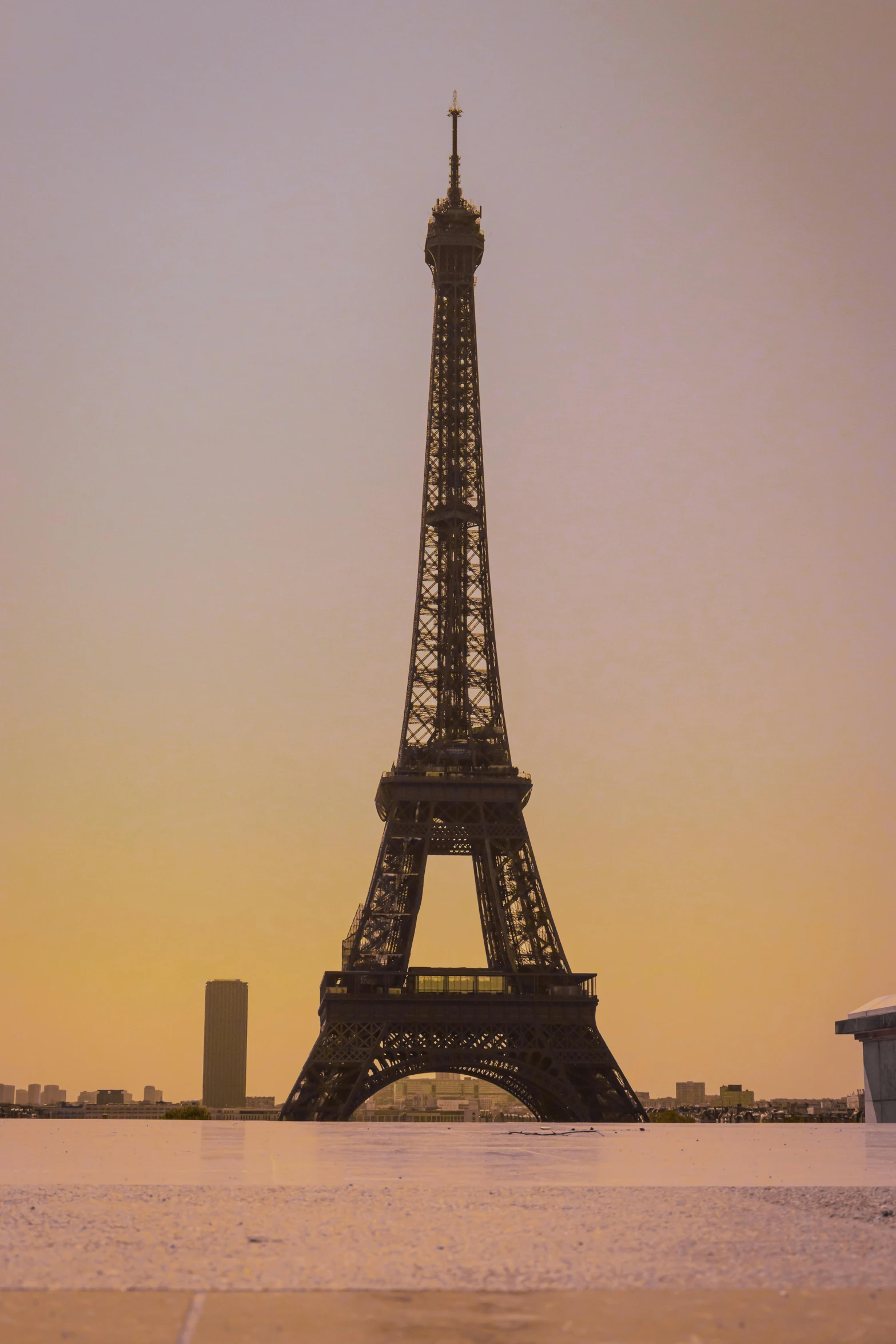 the eiffel tower is towering high into the sky