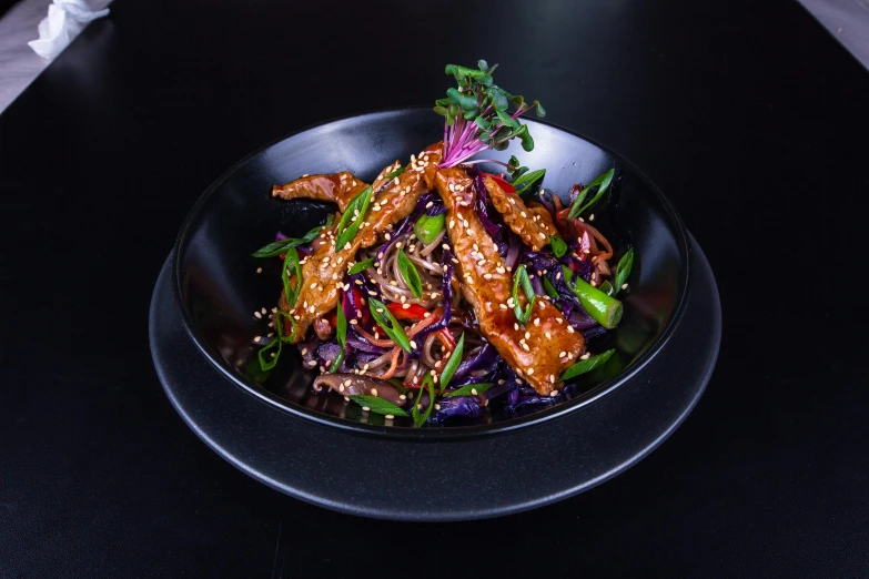 asian stir fry with beef on top and broccoli