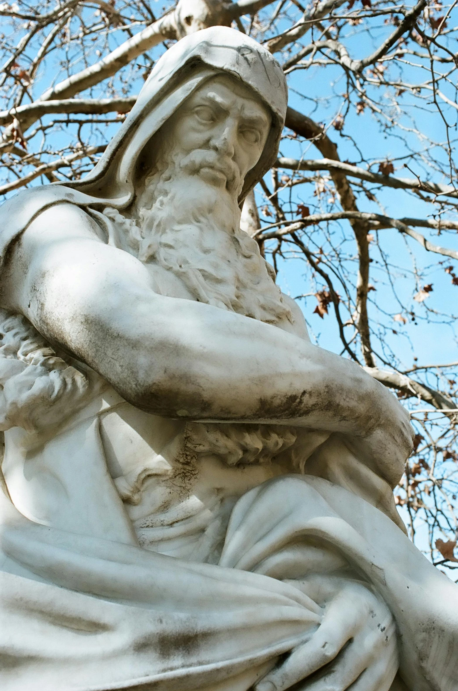 the statue of an old man is pictured on display