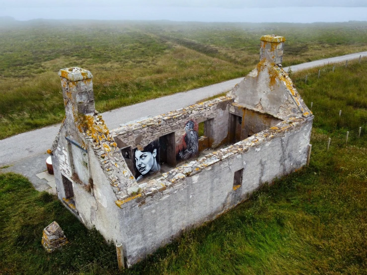 a small house made out of rubble and rocks