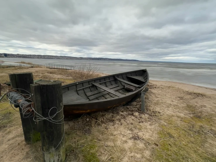 the old canoe is ready to be loaded onto land