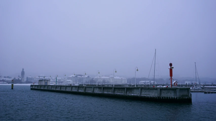 a body of water with the city in the background