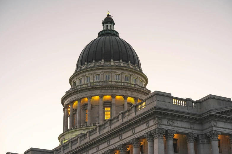 the view of the dome of a building with lights on