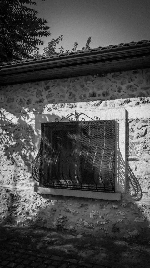 the back door of a house with a small metal window on it