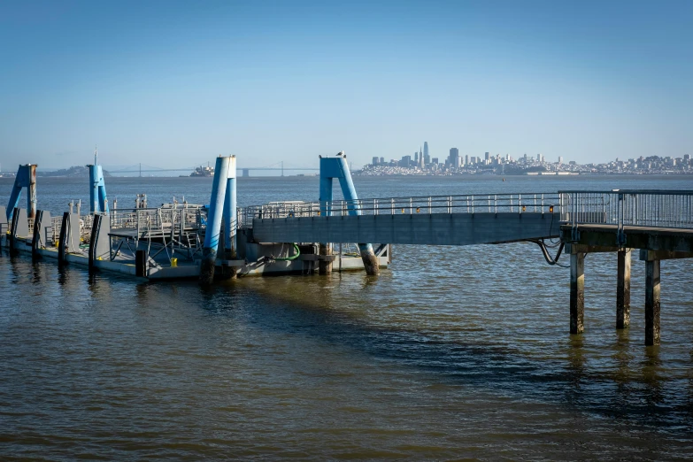 a pier with two wooden posts on it