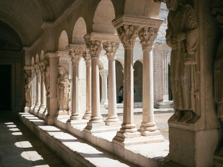 a stone building with columns in it