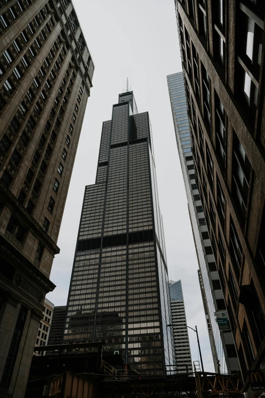 looking up at tall buildings in the city