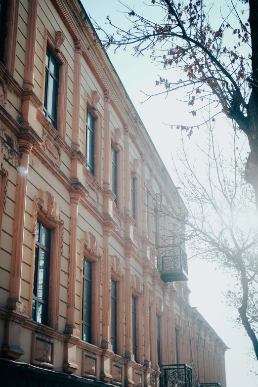 a row of old buildings sit along the street