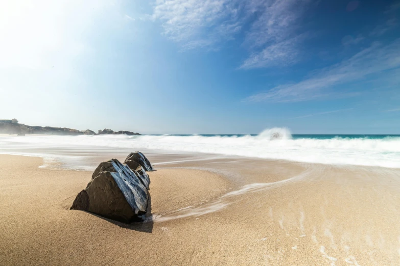 the boat has been washed ashore on the beach