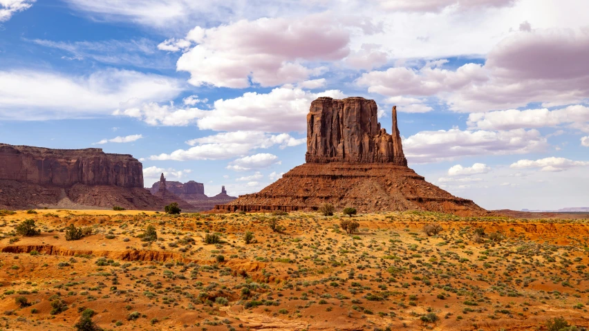 monument rising in the desert as viewed from another planet