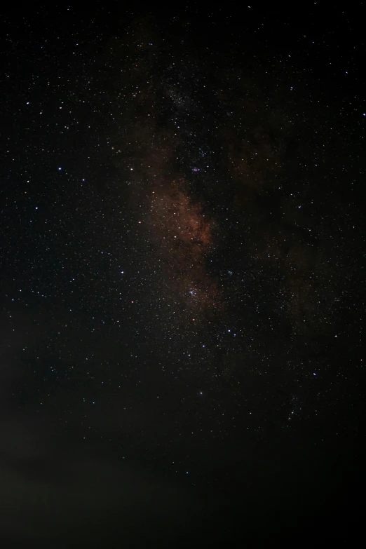 a view of some dark night sky with stars