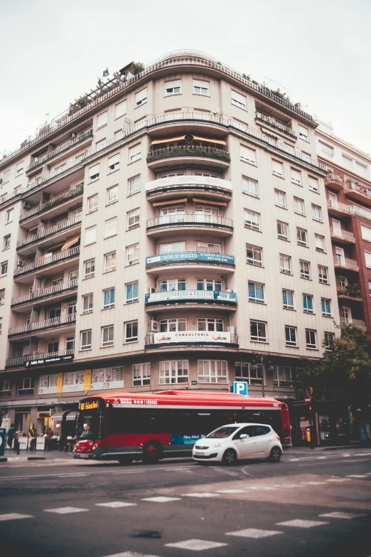 an old building sitting on the corner of a street