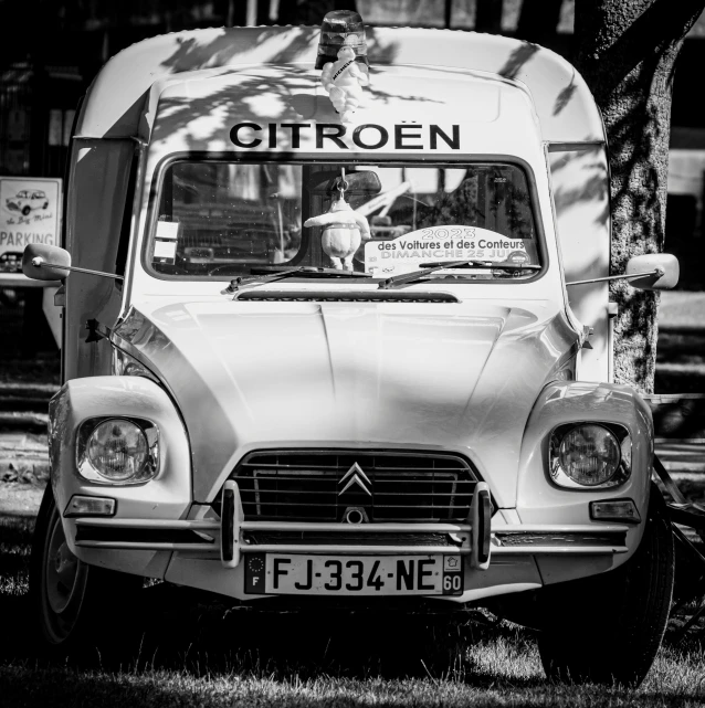 black and white pograph of a parked citron van