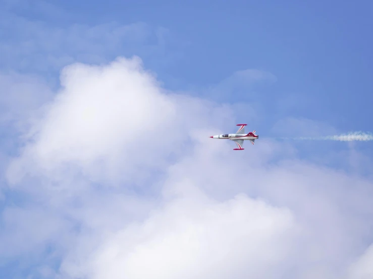 an airplane that is flying in the sky