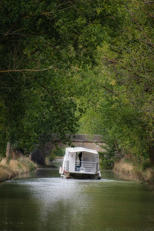 a small boat that is going down some water