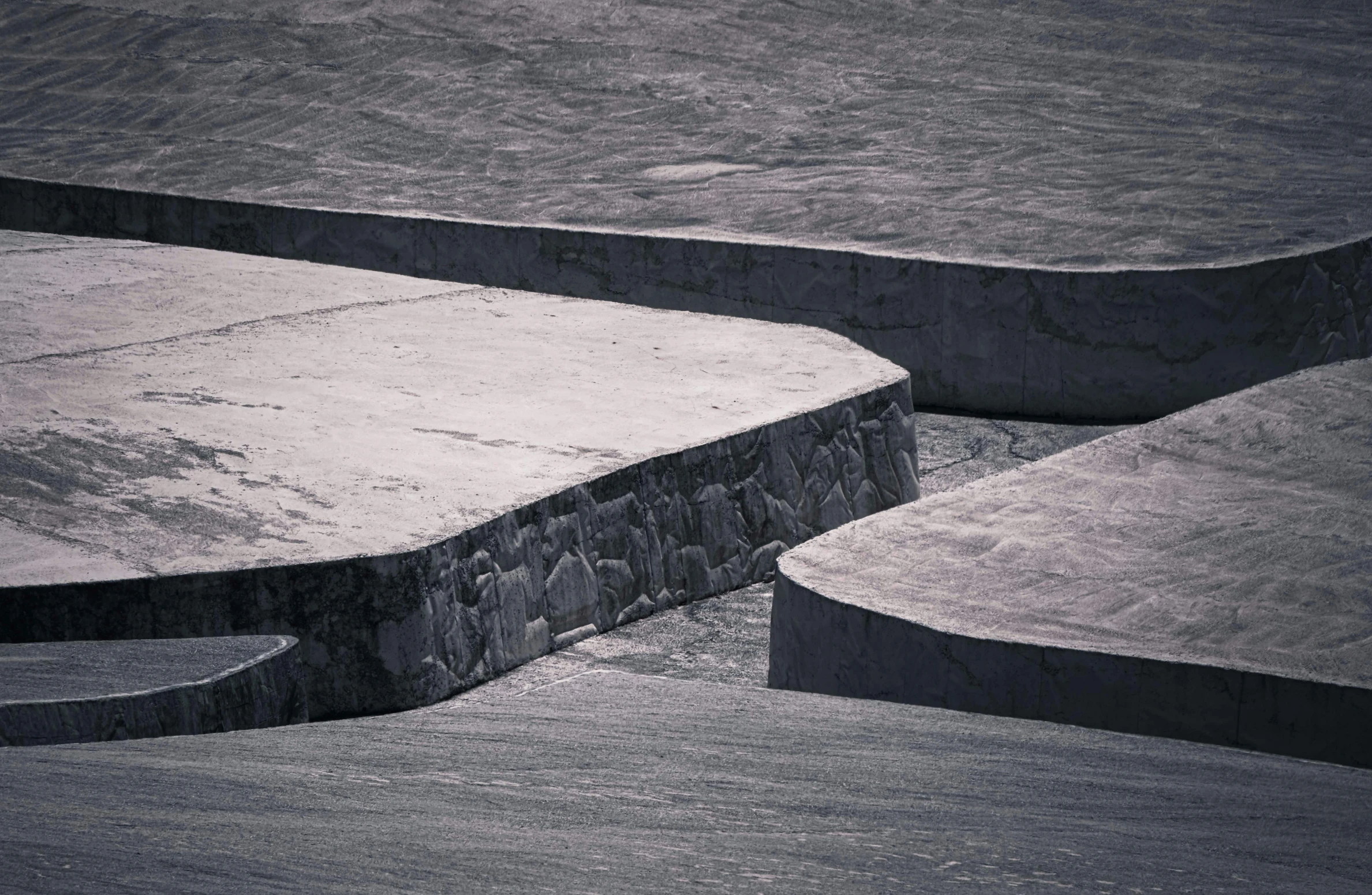 an individual doing tricks on a skateboard at a skate park