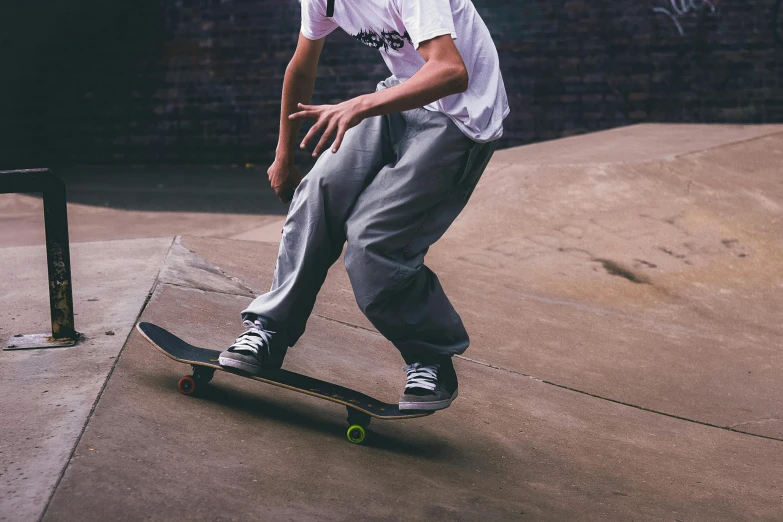 a man riding a skateboard across the street