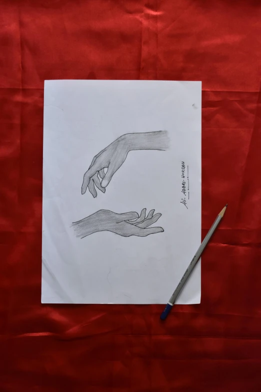 two hands are in each other's arms as they are depicted on a piece of paper