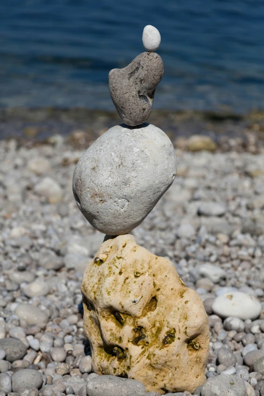 a stack of rocks that has one sitting on top of the other