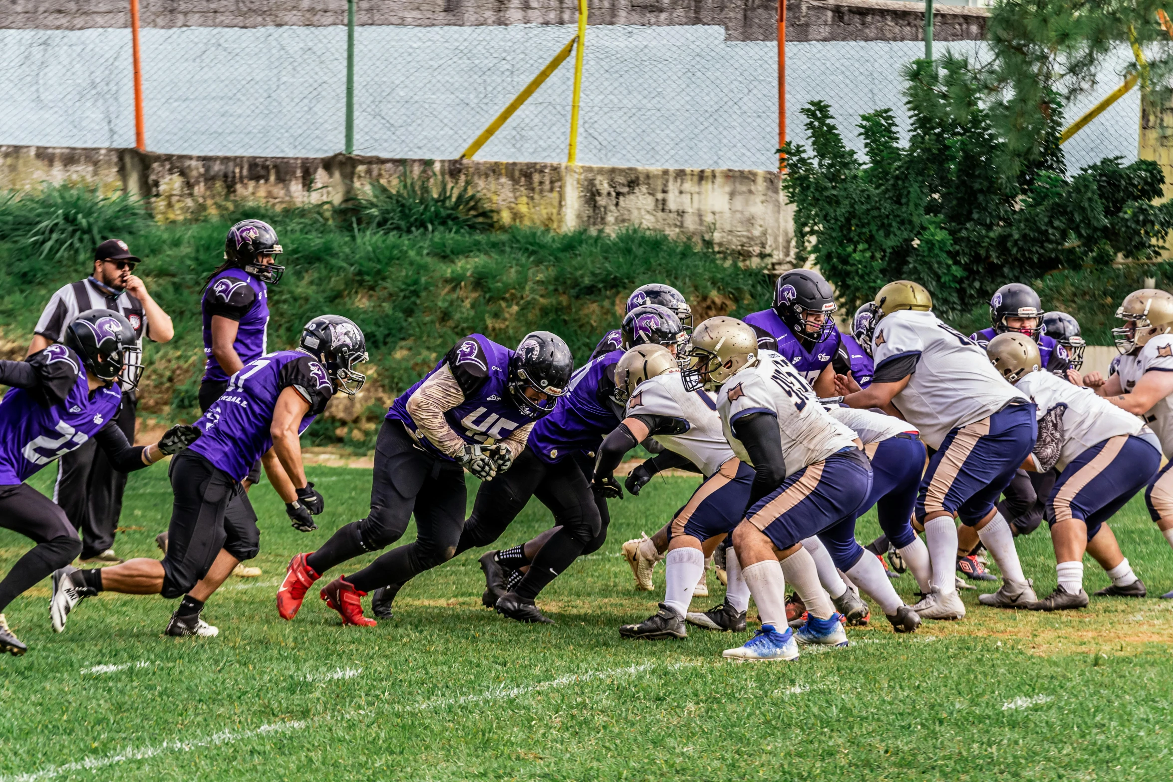 a group of people on a field playing a game