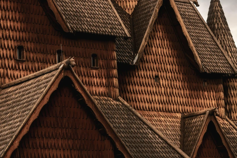 a big building with two towers made of straw