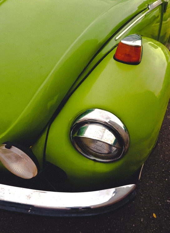 the front of a classic car with the hood down