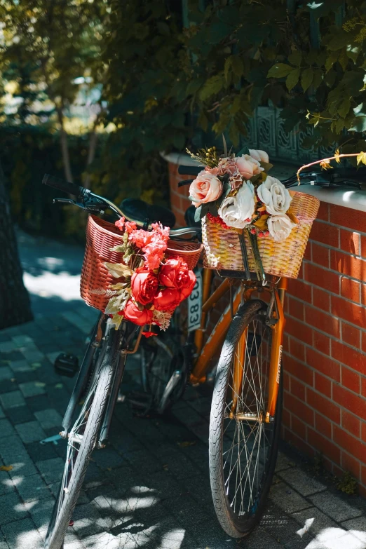 a bike parked next to a red brick wall