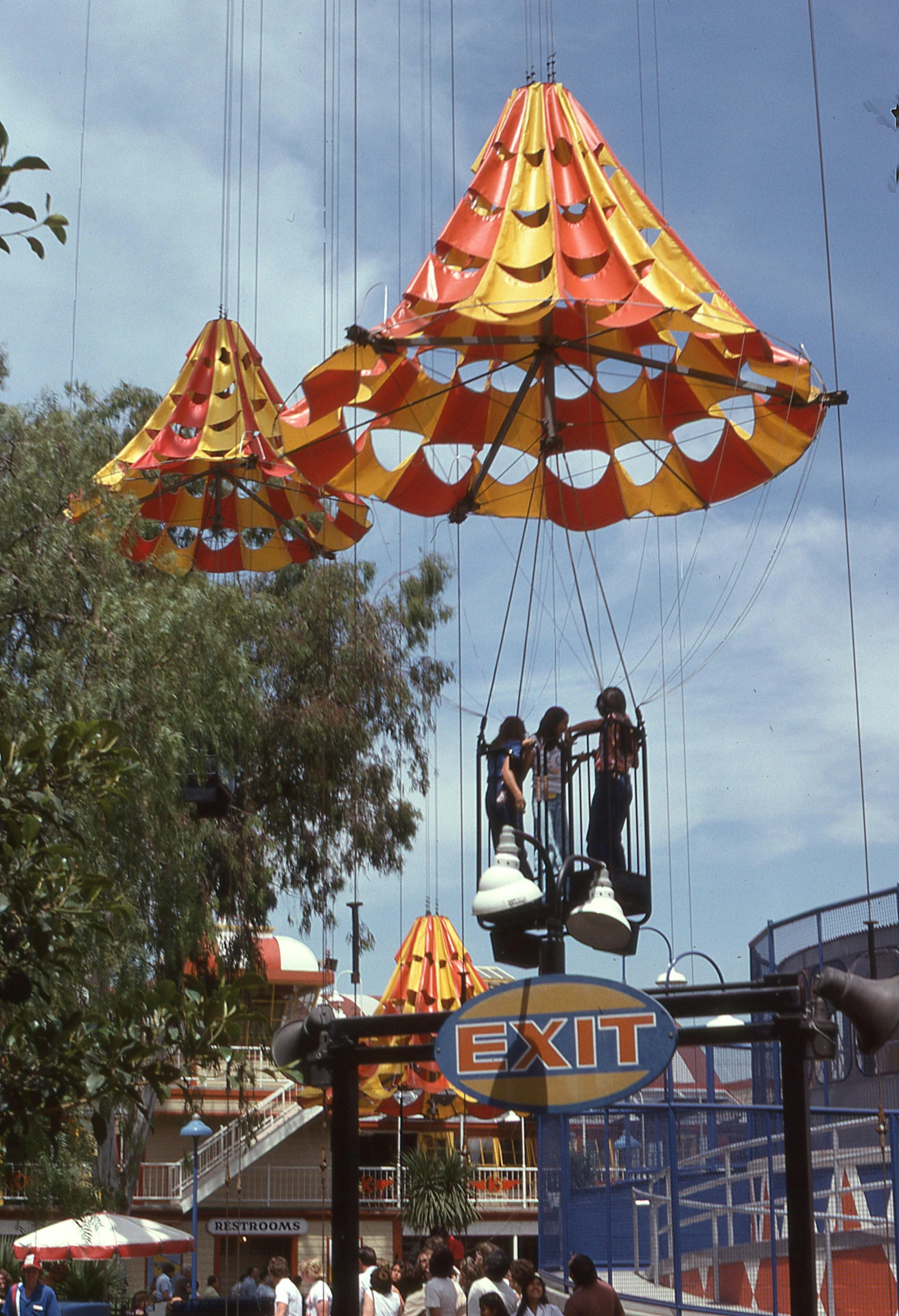 two s riding a ferris wheel in a carnival