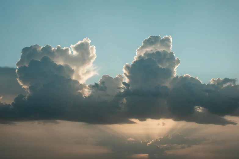 several clouds that are sitting in the sky