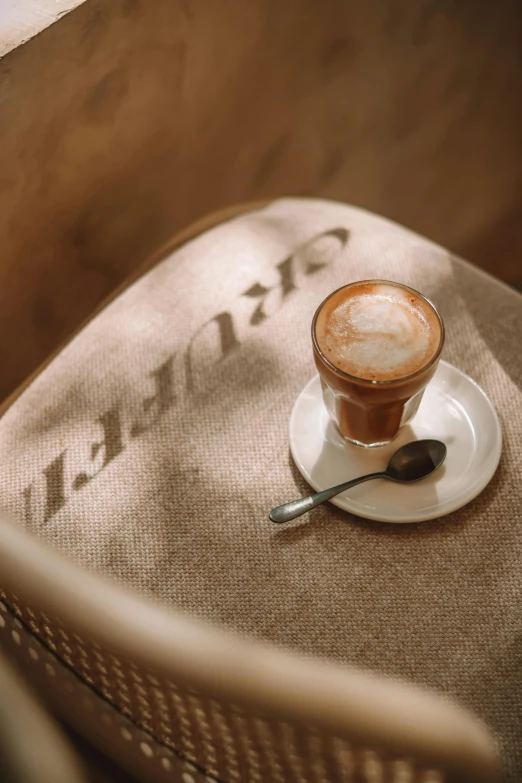 the coffee is on top of the saucer and on the table