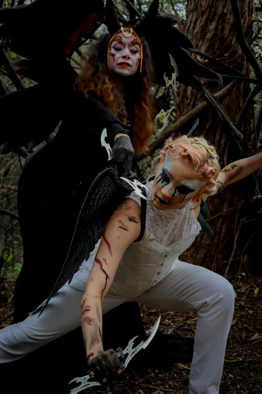 two men dressed in costume posing next to each other