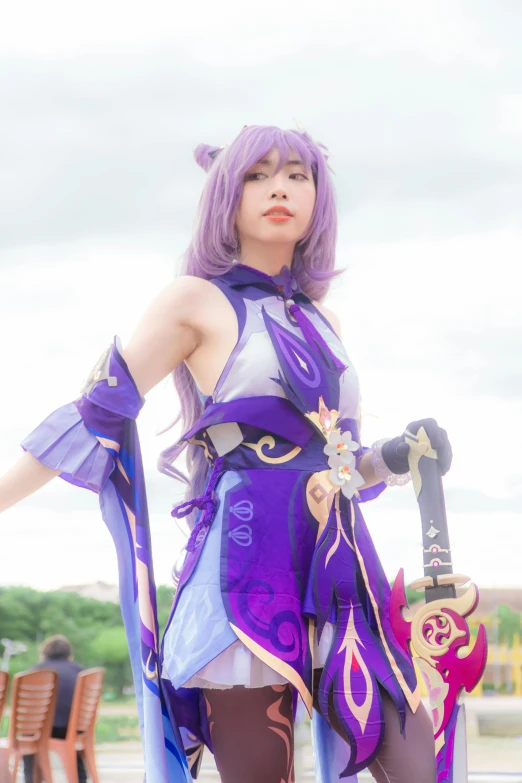 a woman wearing purple with a purple hair holding a sword