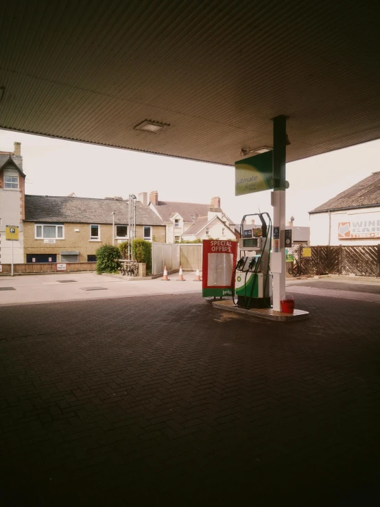 a shell pump on the side of a road